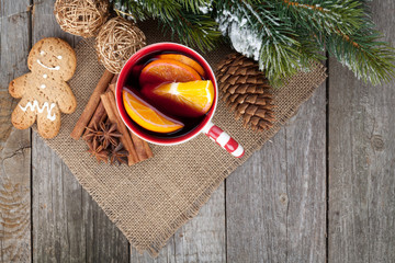 Christmas mulled wine with fir tree, gingerbread and spices