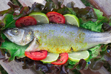 Baked sea bass with vegetables