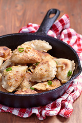 Dumplings fried with onion