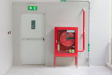 Naklejka premium Fire exit door and fire extinguish equipment