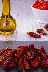 dried tomatoes and cherry tomatoes with oil