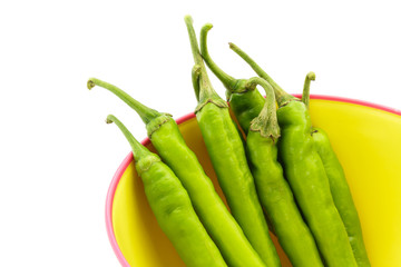 Green pepper and Plastic bowl