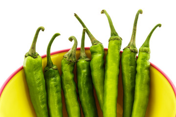 Green pepper and Plastic bowl