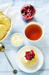 oat scones with cream cheese and caramelised plums