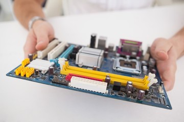 Computer engineer working on broken cpu