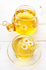 Herbal tea with chamomile flowers