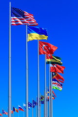 Flags against blue sky, copyspace