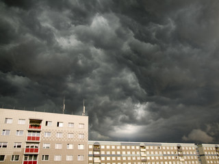 House with dramatic clouds