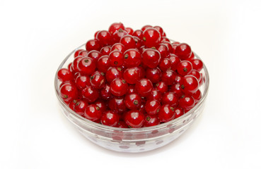 fresh red currants in a glass bowl