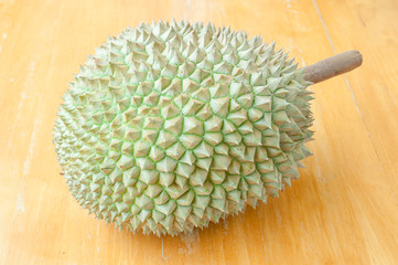 Durian fruit on wood background