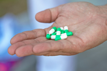 the doctor gave the patient medication capsules