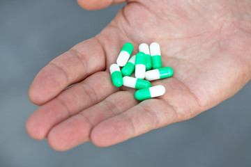 the doctor gave the patient medication capsules