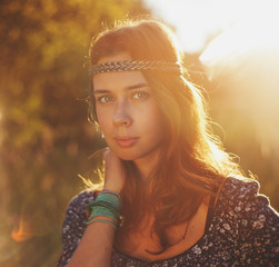 Beautiful hippie girl in the park.