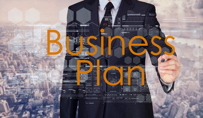 businessman writing business plan