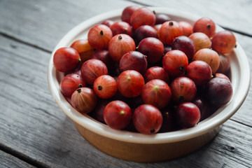Red gooseberries in plate