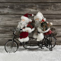 Weihnachtsgeschäft: Weihnachtskarte mit Tandem und Santa Claus
