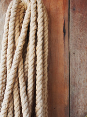 Fototapeta na wymiar rope on the wooden wall