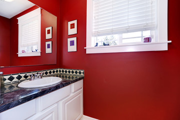 Bathroom with bright red walls