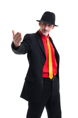 Man in suit and hat on white