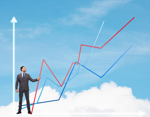 smiling man holding graph line