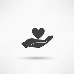 Hands and heart. Icon of kindness and charity