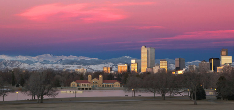 Denver Colorado And Rocky Mountain Skyline At Sunrise