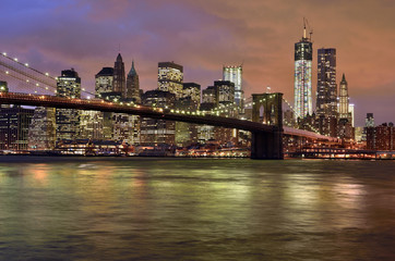 Fototapeta na wymiar New York City - Brooklyn Bridge, Manhattan skyline at night, USA