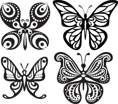 Silhouettes of butterflies with open wings tracery