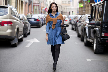Young woman walking on the street