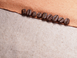 coffee crop beans on fabric textile texture background