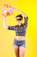 Beautiful young brunette girl in pinup style