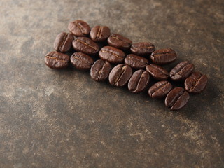 Coffee crop beans with paper on  texture