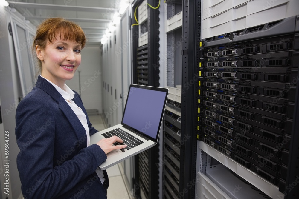 Aufkleber pretty technician using laptop while working on servers