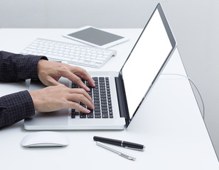 Man hands typing laptop computer keyboard