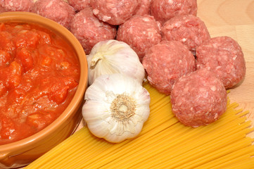 Raw Meatballs and dried Spaghetti Ingredients