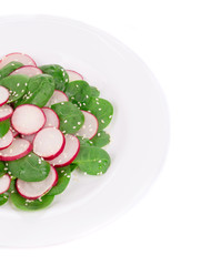Radish salad with spinach and sesame.