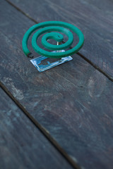 Mosquito coil on the wood