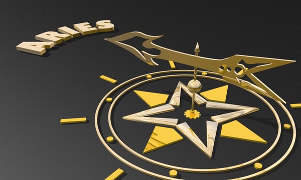 golden compass pointing the zodiac aries constellation name
