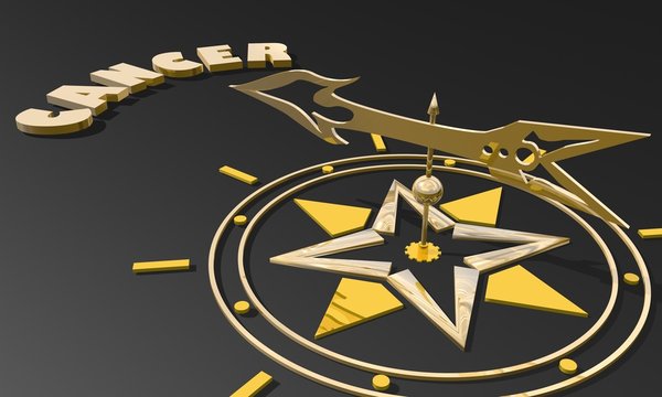 golden compass pointing the zodiac cancer constellation name