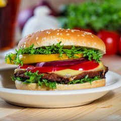 close up of hamburger on white plate