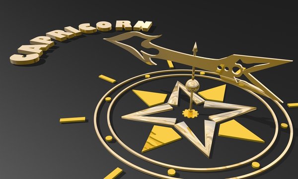 golden compass pointing the zodiac capricorn constellation name