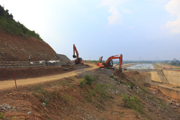 Fototapeta premium Backhoe on a Construction Site