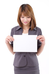 Naklejka premium Business woman holding a banner, board, blank card or banner