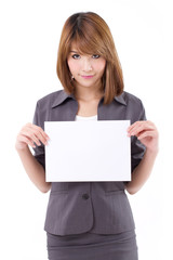 Naklejka premium Business woman holding a banner, board, blank card for text spac
