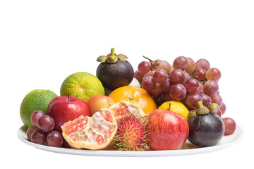 Group fruits on dishware