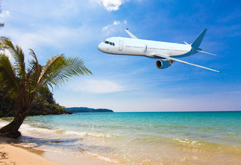 Fototapeta premium Jet plane over the tropical sea