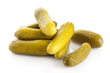 marinated pickled cucumbers isolated on white.