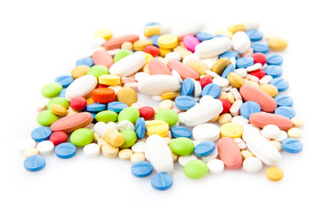  Pile of various colorful pills isolated on white