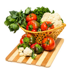 Set fresh vegetables in a basket.
