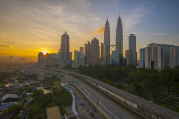 Fototapeta na wymiar Sunrise over Kuala Lumpur city centre in the morning.